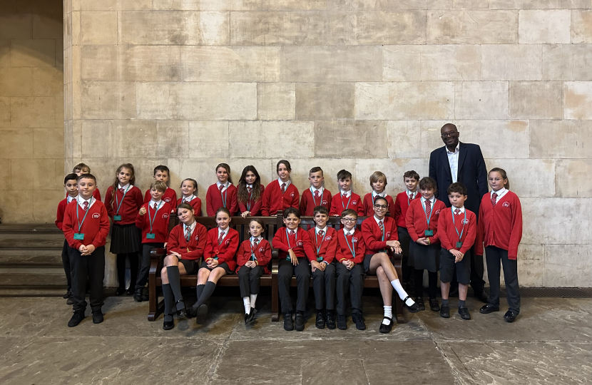 Kwasi with pupils from Springfield Primary School
