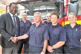 Kwasi and fire fighters